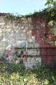 Thumbnail of S. face, detail of junction of earliest ashlar wall with red brick retort house wall to its east, view N, 2m.
