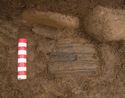 Thumbnail of Plate 4.14: detail of pottery in situ in pit 4129, scale 0.1m.