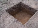 Thumbnail of Oblique shot of Test Pit 4 from the WSW