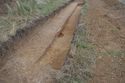 Thumbnail of E-facing post-excavation of slot in [A0303]