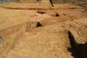 Thumbnail of E-facing pre-excavation shot of extension and feature in Trench A301