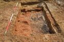 Thumbnail of E-facing pre-excavation photo of deposit (0143) after the removal slot 3