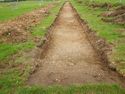 Thumbnail of W-facing post-excavation shot of trench 06 SSG
