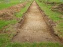 Thumbnail of W-facing post-excavation shot of trench 06 SSG