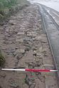 Thumbnail of Rails and stone surface looking northwest