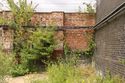 Thumbnail of The northern end of the west wall of the former Parkway Carriage Shed, viewed from the east