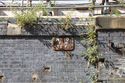 Thumbnail of Cast iron sign at west cutting wall, within the boundary of the former DB Cargo Shed