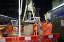 Thumbnail of Lifting of the statue with pedestal cap attached. Viewed from the north