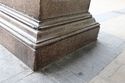 Thumbnail of Oblique of north-west corner, showing damage to moulding and lower joint of the die. Viewed from the north-west
