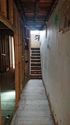 Thumbnail of No.61. Interior, ground storey. Staircase and hallway, facing east