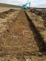 Thumbnail of East facing shot of trench 6 (1m x 1m scale)
