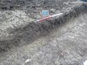 Thumbnail of South-west facing oblique shot of pit [1211] (1m scale)