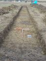 Thumbnail of North-west facing shot of Trench 46 (1m x 1m scale)