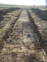 Thumbnail of East facing shot of Trench 46 (1m x 1m scale)
