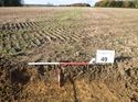 Thumbnail of Photo 1010437 southeast facing repsentative section of trench 49 taken at Hunts Green Farm