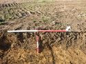 Thumbnail of Photo 1010438 southeast facing repsentative section of trench 49 taken at Hunts Green Farm