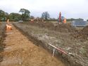 Thumbnail of Photo 1010678 southeast facing working shot of trench 26 taken at Hunts Green Farm