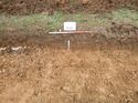 Thumbnail of Photo 1010713 east view of trench 111 taken at Hunts Green Farm