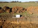 Thumbnail of Photo 1010735 south facing representative section of trench 117 taken at Hunts Green Farm