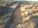 Thumbnail of Photo 1010795 west view of trench 150 taken at Hunts Green Farm