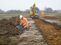 Thumbnail of Photo 1010838 southeast facing working shot of trench 66 taken at Hunts Green Farm