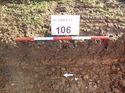 Thumbnail of Photo 1010959 west facing representative section of trench 106 taken at Hunts Green Farm