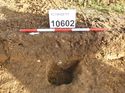 Thumbnail of Photo 1010993 west facing section of posthole [910602] taken at Hunts Green Farm