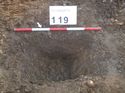 Thumbnail of Photo 1010997 northeast facing section of treethrow in trench 119 taken at Hunts Green Farm