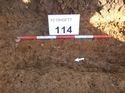 Thumbnail of Photo 1020009 west facing section of natural feature in trench 114 taken at Hunts Green Farm