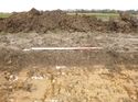 Thumbnail of Photo 1020034 northwest facing representative section of trench 88 taken at Hunts Green Farm
