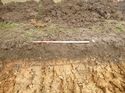 Thumbnail of Photo 1020055 south facing representative section of trench 95 taken at Hunts Green Farm