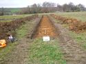 Thumbnail of Photo 1020056 south facing representative section of trench 95 taken at Hunts Green Farm