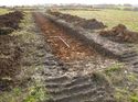 Thumbnail of Photo 1020075 southeast view of trench 100 taken at Hunts Green Farm