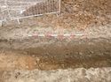 Thumbnail of Photo 1020008 southwest facing section of natural feature in trench 114 taken at Hunts Green Farm