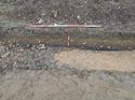 Thumbnail of Photo 021312 southwest facing section of pit [902702] taken at Hunts Green Farm view 2 no board