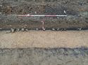 Thumbnail of Photo 021316 southwest facing section of pit [902702] taken at Hunts Green Farm view 4 no board