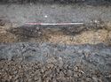 Thumbnail of Photo 021358 northeast facing section of pit [907310] taken at Hunts Green Farm view 3 no board