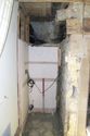 Thumbnail of Photo 098. Alcove SbE of sitting room fireplace (flash). Looking WbS. Scale 1m.