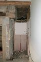 Thumbnail of Photo 102. Alcove NbW of sitting room fireplace (flash). Looking WbS. Scale 1m.