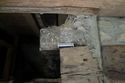 Thumbnail of Photo 105. SbE corner of fireplace at top. Looking WbS. Scale 100mm.