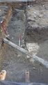 Thumbnail of Stone-lined & capped drain in service trenching