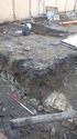 Thumbnail of Stone-lined & capped drain in service trenching