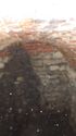 Thumbnail of Interior of stone chamber in SE corner of quad