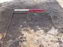 Thumbnail of Intersection of ditch 3101 (filled with stone) and 3102 (cutting 3101)