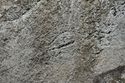 Thumbnail of Single eye petroglyph E14 in quarry bay on  exterior of Rano Raraku