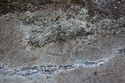 Thumbnail of Pair of eye petroglyphs I04 in quarry bay in interior of Rano Raraku