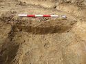 Thumbnail of Furrow, SE facing section, trench 447, looking NW