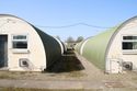Thumbnail of View through Huts 103 and 102