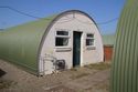 Thumbnail of Close up image of a Nissen Hut within the Site