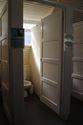 Thumbnail of View of toilet cubicles with panelled doors